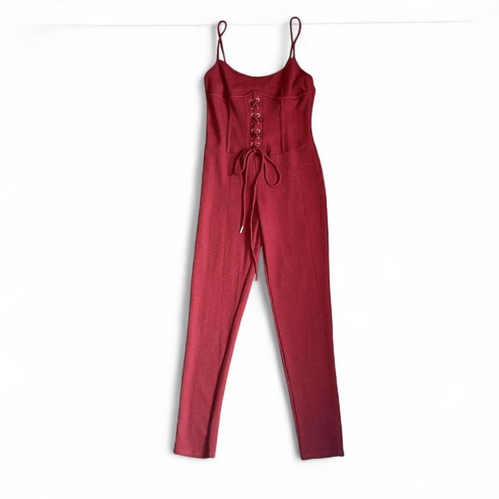 Fashion Nova ribbed burgundy lace-up jumpsuit with adjustable straps